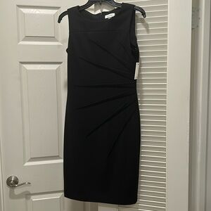 Calvin Klein. Black mid-length dress. Size-4